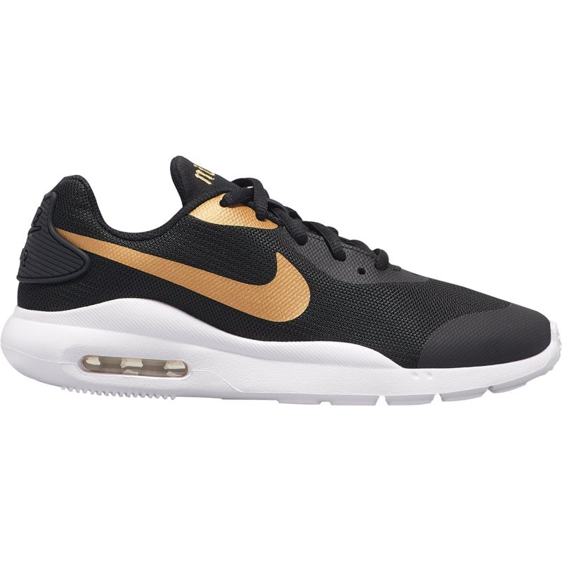 pantalones nike dorados